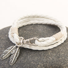 Load image into Gallery viewer, Carved Leather With Feather Bracelet
